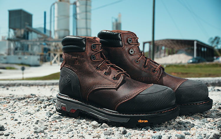 Justin Warhawk nano comp toe botas con cordones en marrón